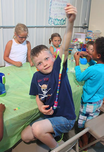 Kid at camp Young boy enjoying a kids camp